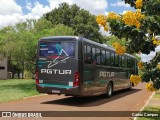 Empresa de Transporte Pgtur 1413 na cidade de Tupãssi, Paraná, Brasil, por Carlos Campos. Número da foto: #:id.