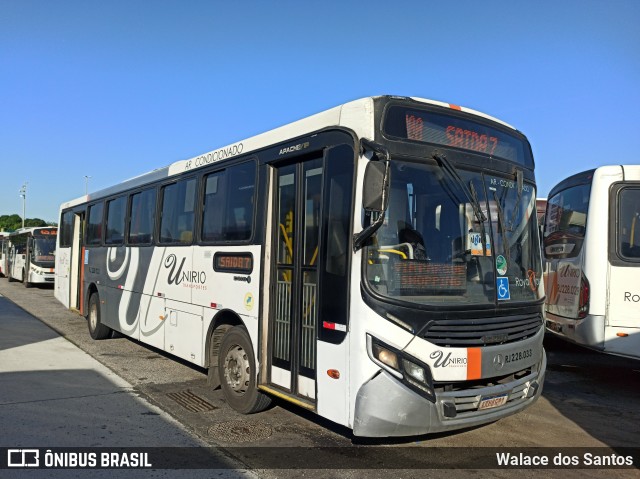 UniRio Transportes RJ 228.033 na cidade de Rio de Janeiro, Rio de Janeiro, Brasil, por Walace dos Santos. ID da foto: 10135803.