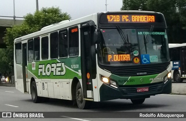 Transportes Flores RJ 128.301 na cidade de Rio de Janeiro, Rio de Janeiro, Brasil, por Rodolfo Albuquerque. ID da foto: 10306622.