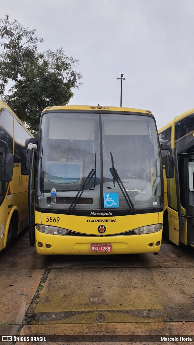 Viação Itapemirim 5869 na cidade de Rio de Janeiro, Rio de Janeiro, Brasil, por Marcelo Horta. Número da foto: #10395263.