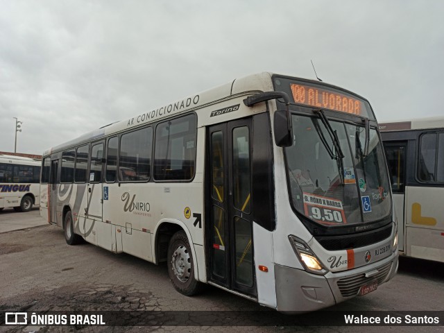 UniRio Transportes RJ 228.019 na cidade de Rio de Janeiro, Rio de Janeiro, Brasil, por Walace dos Santos. Número da foto: #10413772.